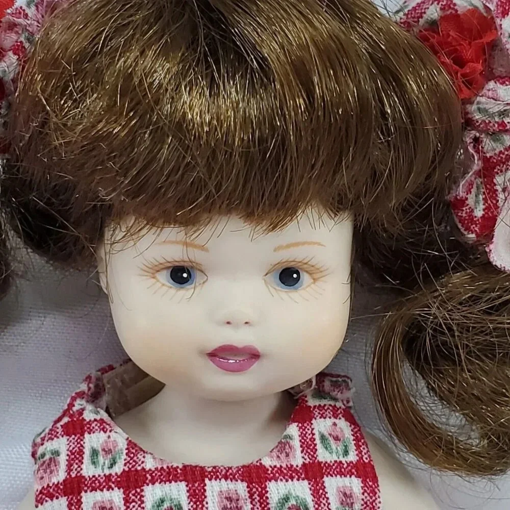 Vintage DELTON Porcelain Doll  Dressed In Red  7 Inch Tall Movable Arms & Legs